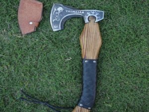 Viking axe with its protective leather cover, showcasing the craftsmanship of the handle and the secure sheath for safe carrying