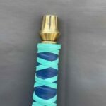 Top view of Legend of Zelda Master Sword replica handle with gold pommel